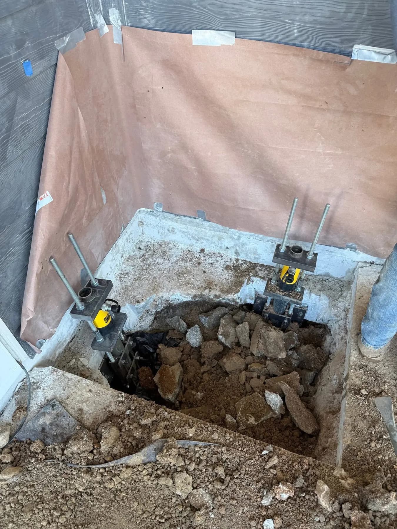 Pier brackets set in an excavation